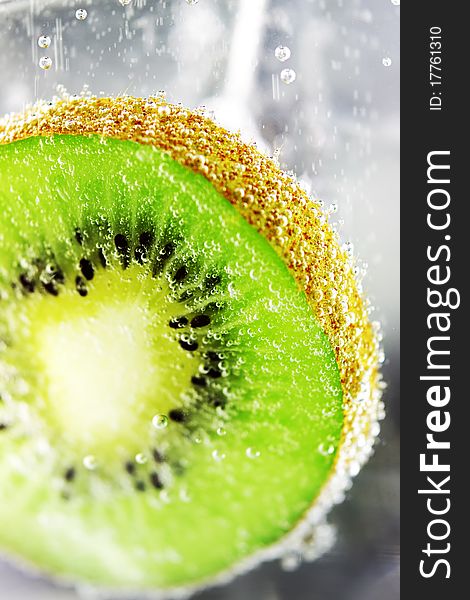 Kiwifruit pulp close in water