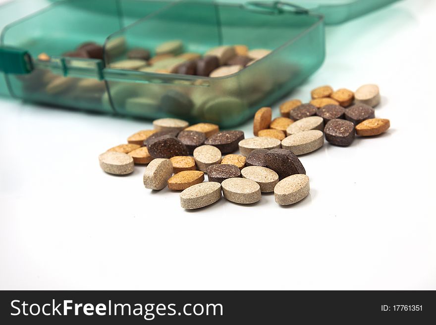 Plant pills isolated in white