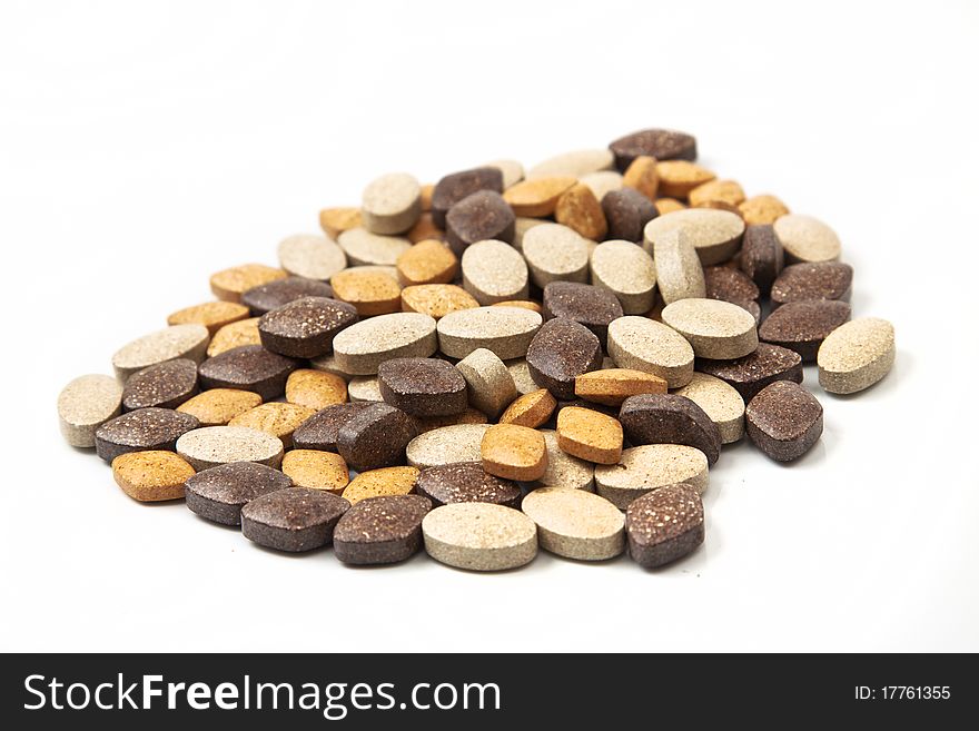 Plant pills isolated in white