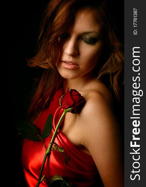 Beauty girl with red rose