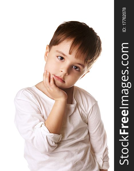 Portrait of beautiful little thoughtful boyisolated on white background. Portrait of beautiful little thoughtful boyisolated on white background