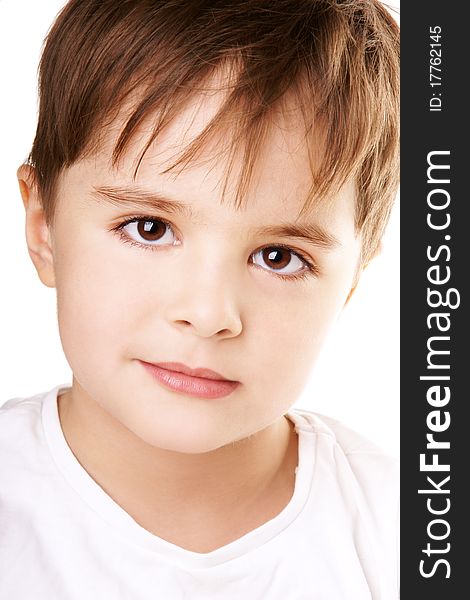 Close-up portrait of beautiful smiling little boy isolated on white background. Close-up portrait of beautiful smiling little boy isolated on white background