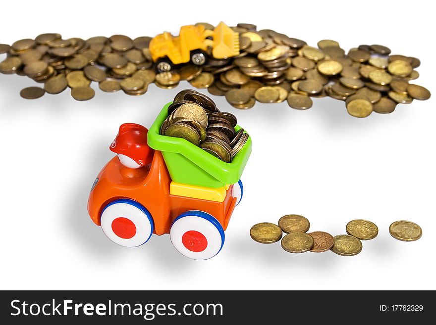 Gold coins are produced and transported with toy cars. white background. Gold coins are produced and transported with toy cars. white background.