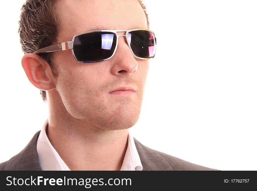 Business man look towards the distance on a white background. Business man look towards the distance on a white background