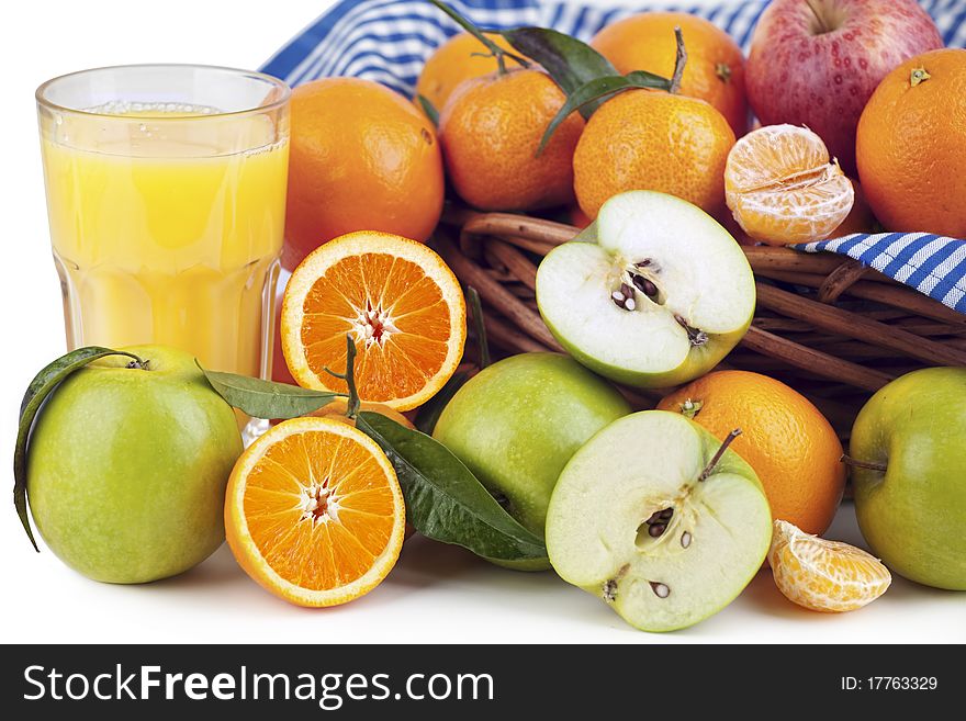 Fresh orange juice and just-picked oranges, Tangerine and Apple. Fresh orange juice and just-picked oranges, Tangerine and Apple