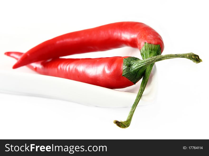 Isolated red hot chili pepers. Isolated red hot chili pepers