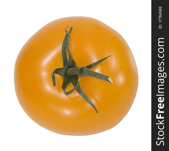 One orange tomato isolaed on the white. One orange tomato isolaed on the white