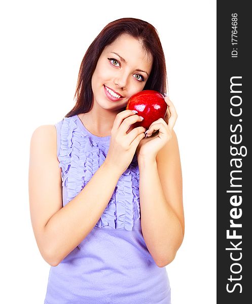 Very beautiful young brunette woman holding a big red apple. Very beautiful young brunette woman holding a big red apple