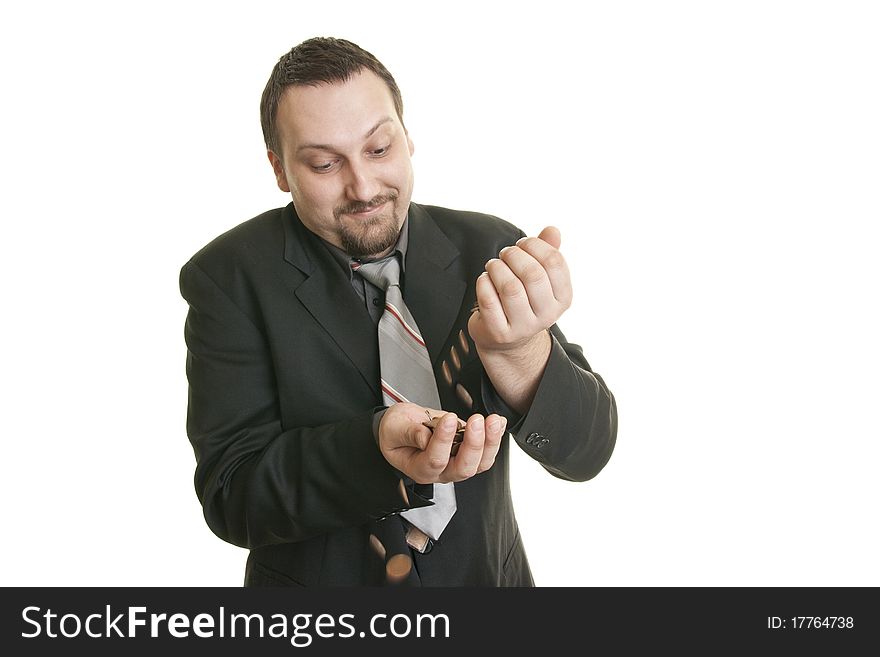 Happy businessman holding coins