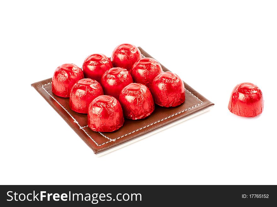 Set of sweets on the table mat. Isolated on white background. Set of sweets on the table mat. Isolated on white background.