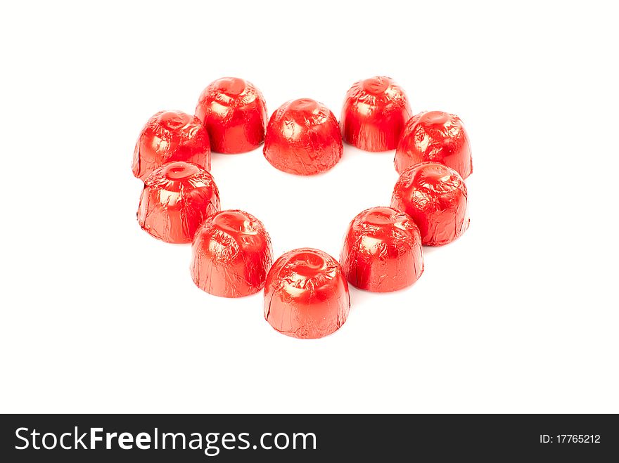 Set of sweets in shape of a heart. Isolated on white background. Set of sweets in shape of a heart. Isolated on white background.