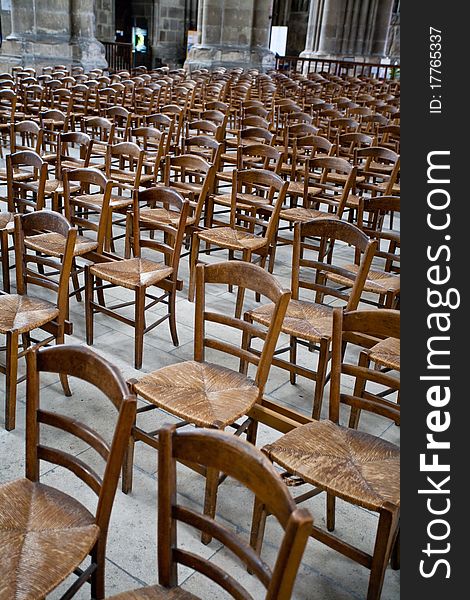 Wood chairs in Catholic cathedral