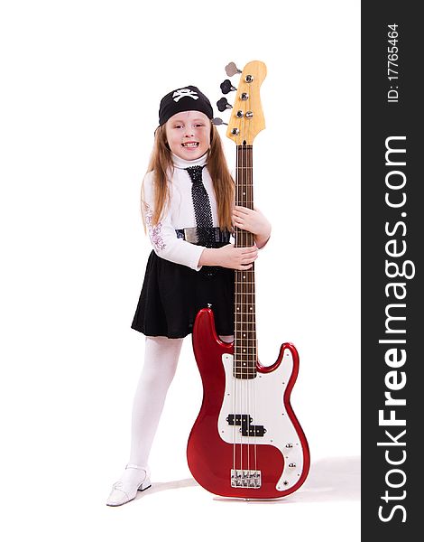 Rock star. Teenager girl playing a bass guitar isolated on white. Rock star. Teenager girl playing a bass guitar isolated on white.