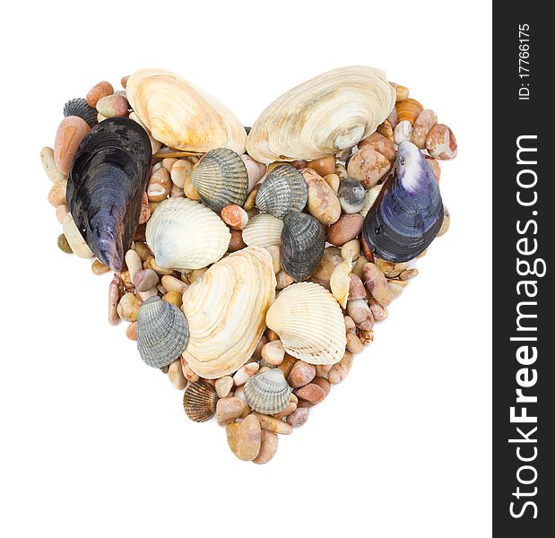 Heart from seashells and stones, isolated on white