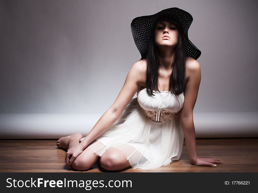 Woman Posing In A Hat
