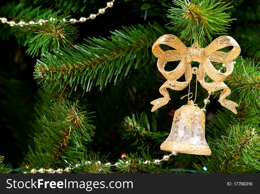 A bow with bell on chrismas tree