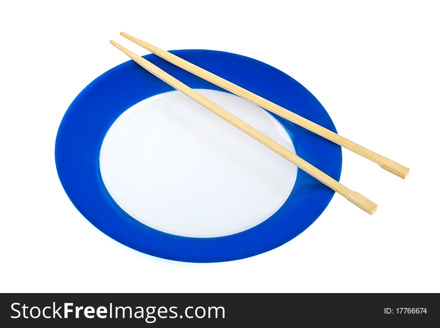 Plate and chopsticks isolated on white background