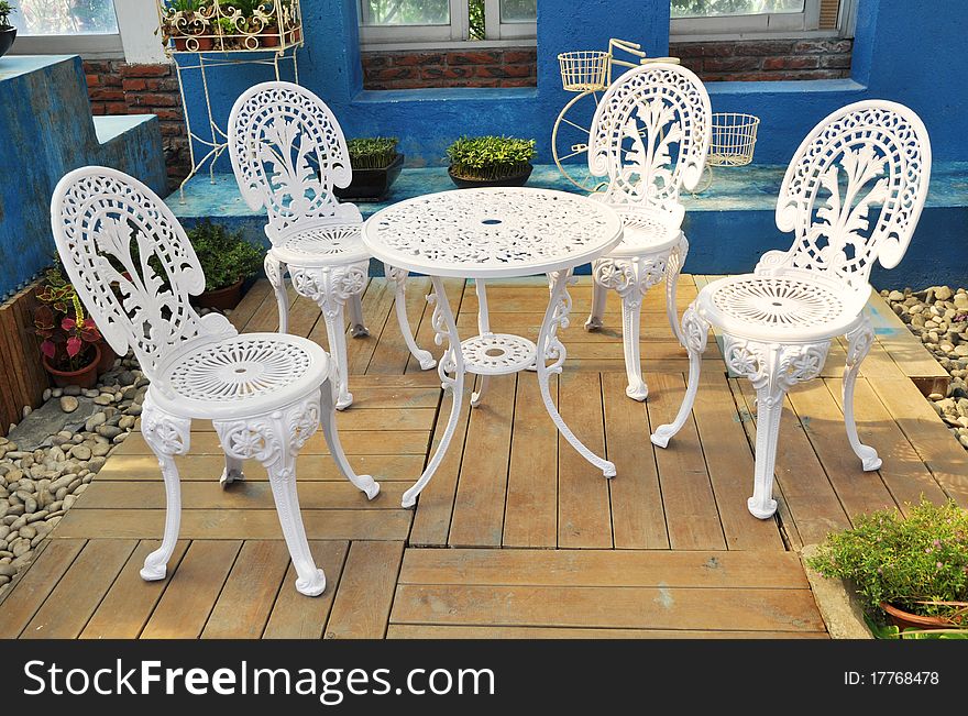 Table And Chairs In Garden