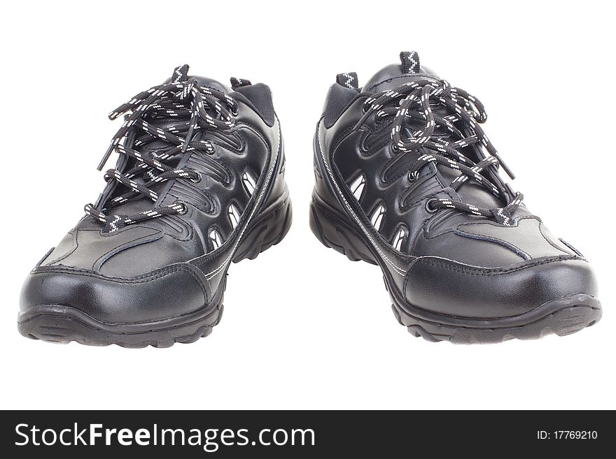 Black leather shoes on a white background