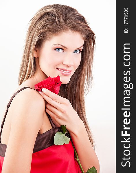 Beauty girl with red rose