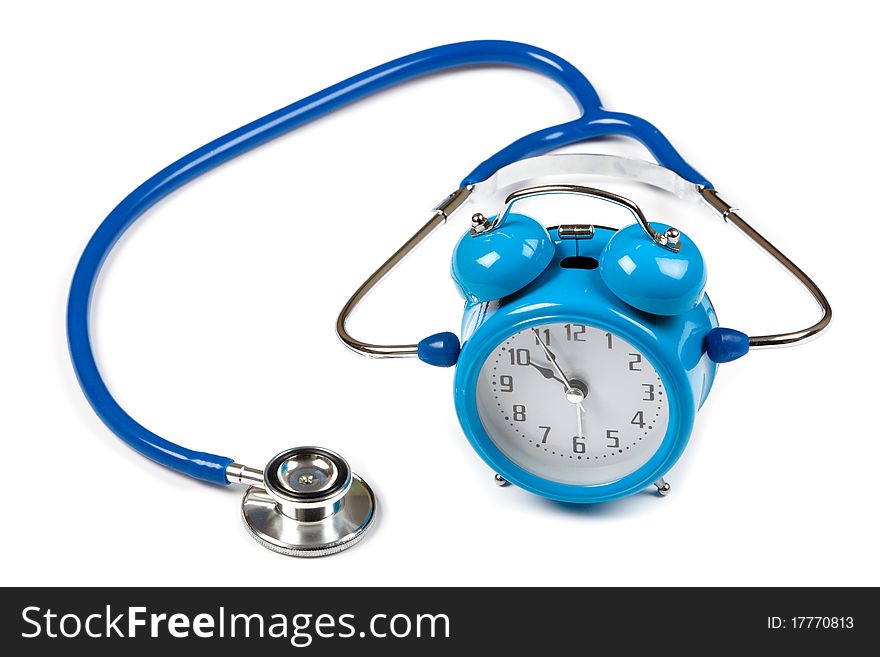 Old Fashioned blue mechanical alarm clock with a stethoscope around. Old Fashioned blue mechanical alarm clock with a stethoscope around