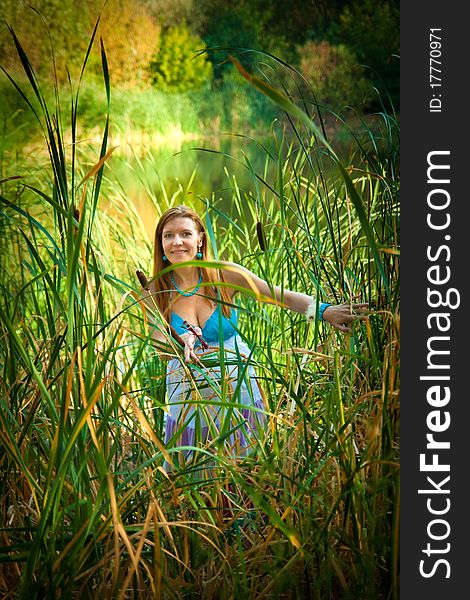 Woman in rush near the pond