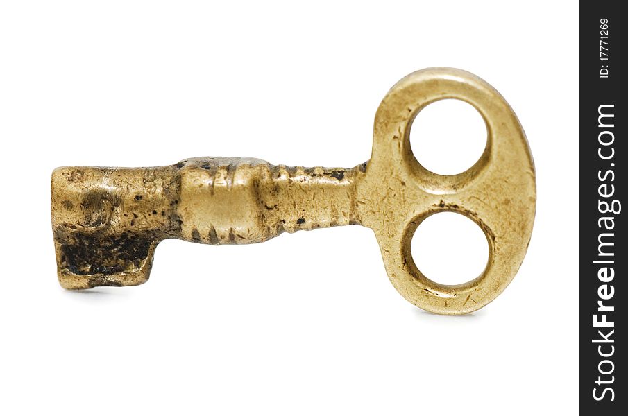 Old key on a white background