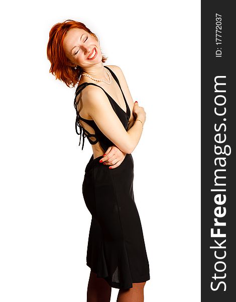 Charming young woman in a black dress laughing. Charming young woman in a black dress laughing