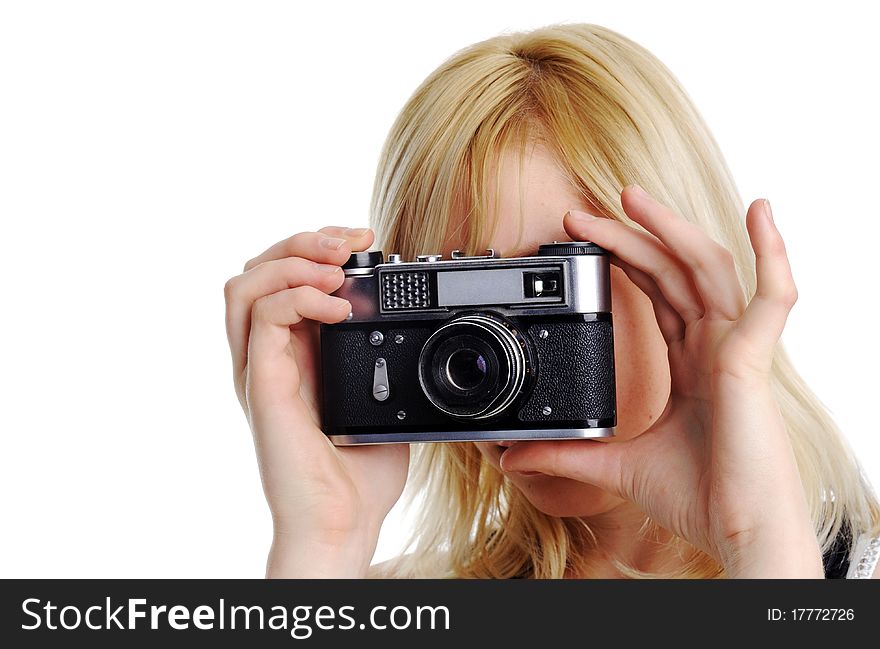 An image of a young woman with a camera. An image of a young woman with a camera