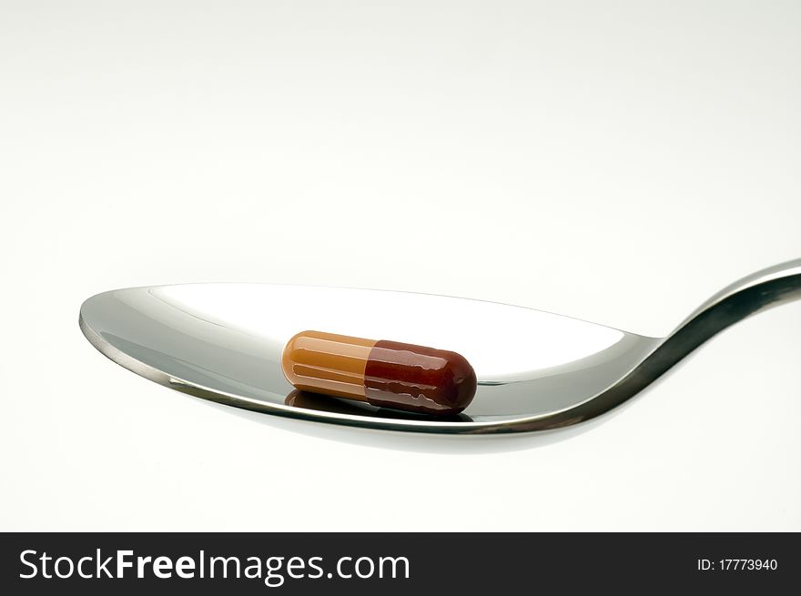 Pill in a spoonful polished