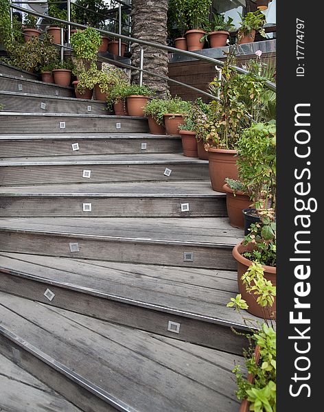 The old staircase on the background of an old house. The old staircase on the background of an old house