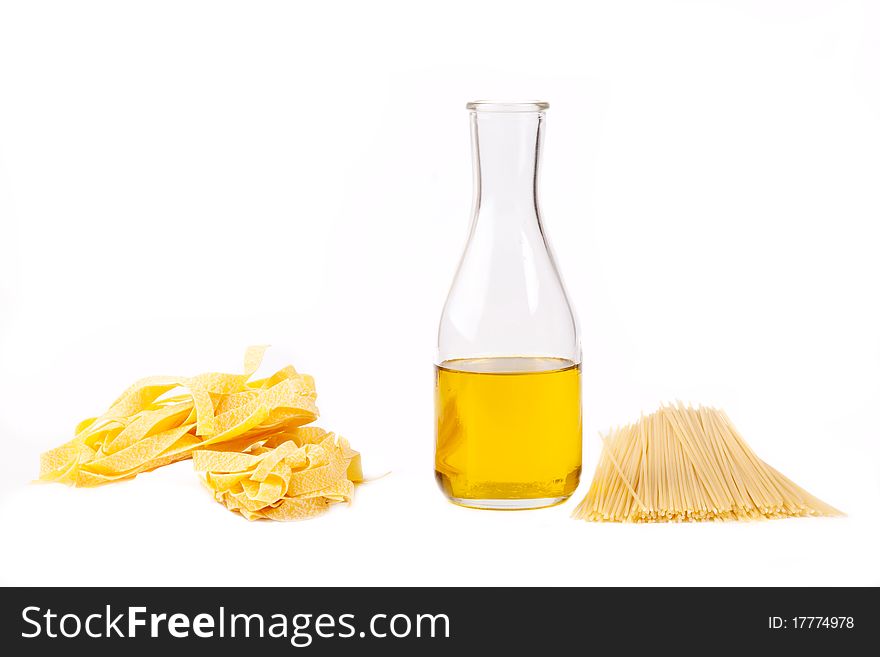 Two kinds of a spaghetti and olive oil bottle on a white background. Focus in the shot center