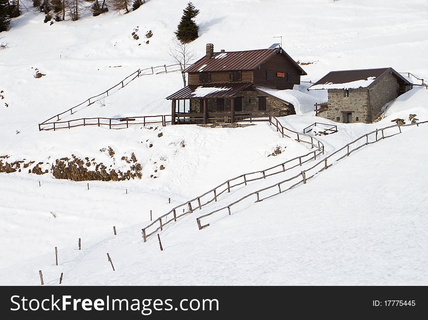 Cabins under snow