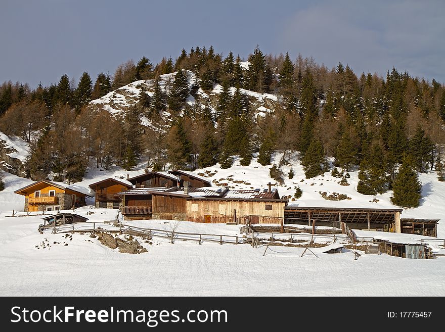 Farm in the North of Italian Alps during winter, Brixia province, Lombardy region, Italy. Farm in the North of Italian Alps during winter, Brixia province, Lombardy region, Italy