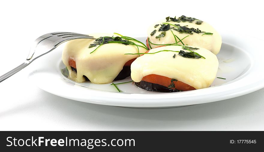 Studio shot of vegetables pyramid , with mozzarella cheese on top