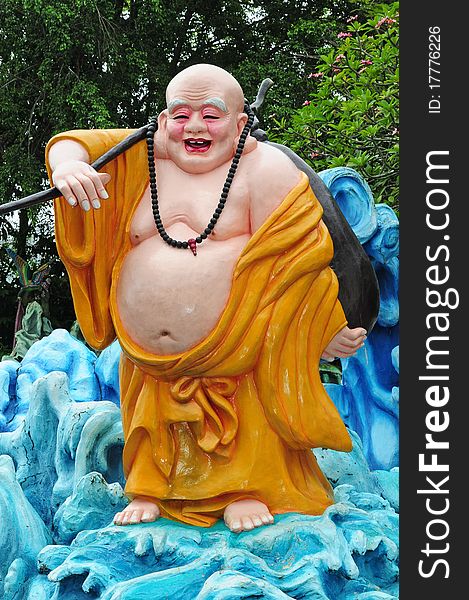 Statue Of A Standing Laughing Buddha