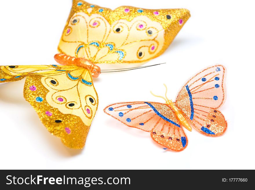 Artificial butterflies on the white background