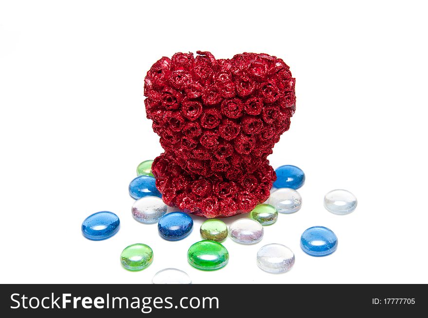Beautiful red heart candle and multicolors gemestones. Beautiful red heart candle and multicolors gemestones