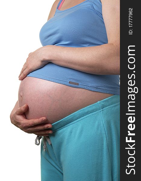 Pregnant woman profile with hands on the stomach over white background. Pregnant woman profile with hands on the stomach over white background