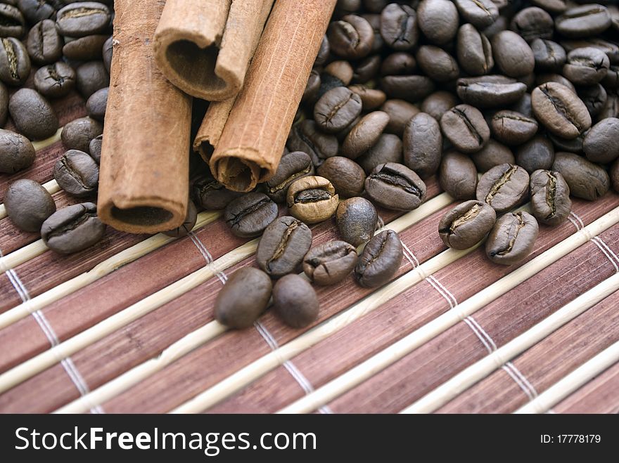 coffee beans and cinnamon sticks