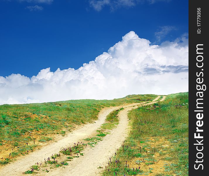 Road lane to sky. Nature composition.