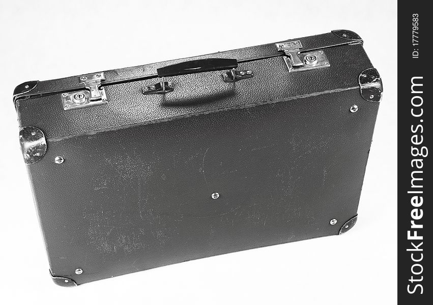 Vintage suitcase in black and white on white background