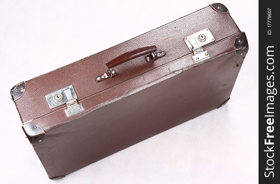 Vintage suitcase on white background