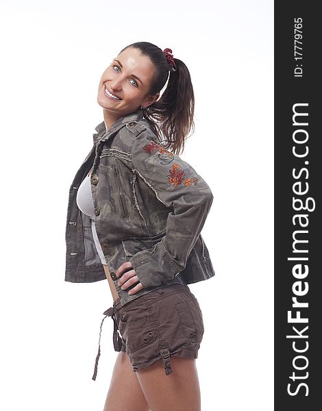 Woman with brown hair in shorts and street-wear jacket - isolated on white. Woman with brown hair in shorts and street-wear jacket - isolated on white