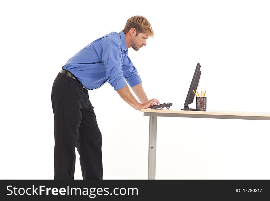 Businessman working on computer at desk