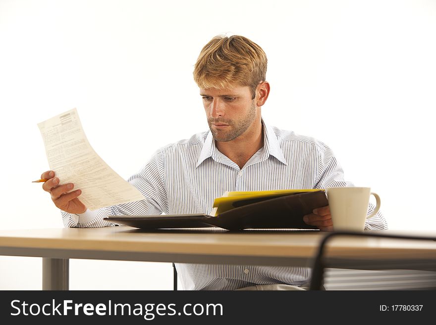 Businessman Working At Desk