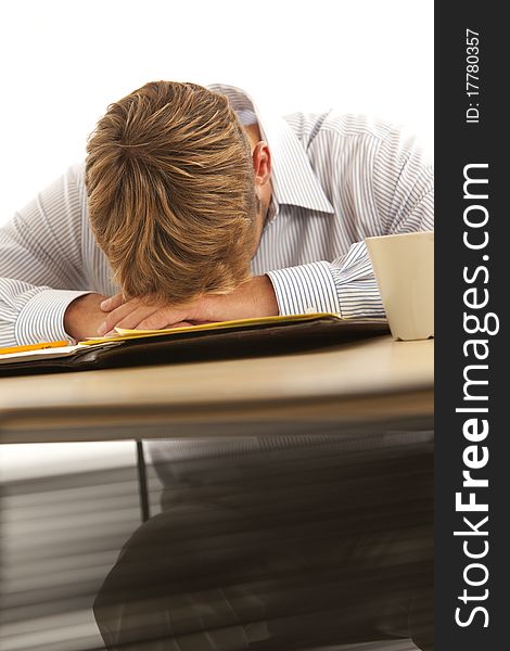 Businessman sleeping at desk