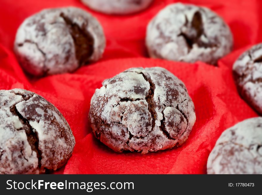 Chocolate biscuits covered with icing sugar