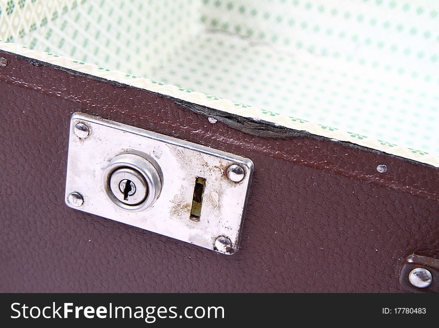 Vintage suitcase with a lock in close up