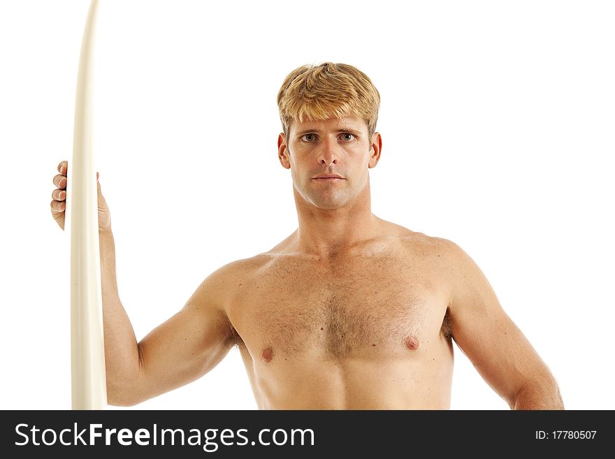Young man standing with surfboard. Young man standing with surfboard